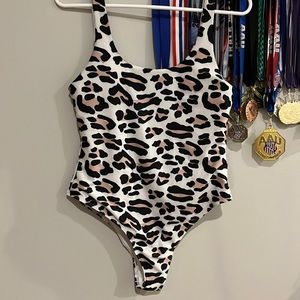 Swimsuits!! Everything large! One piece, tankini,Black bottoms.